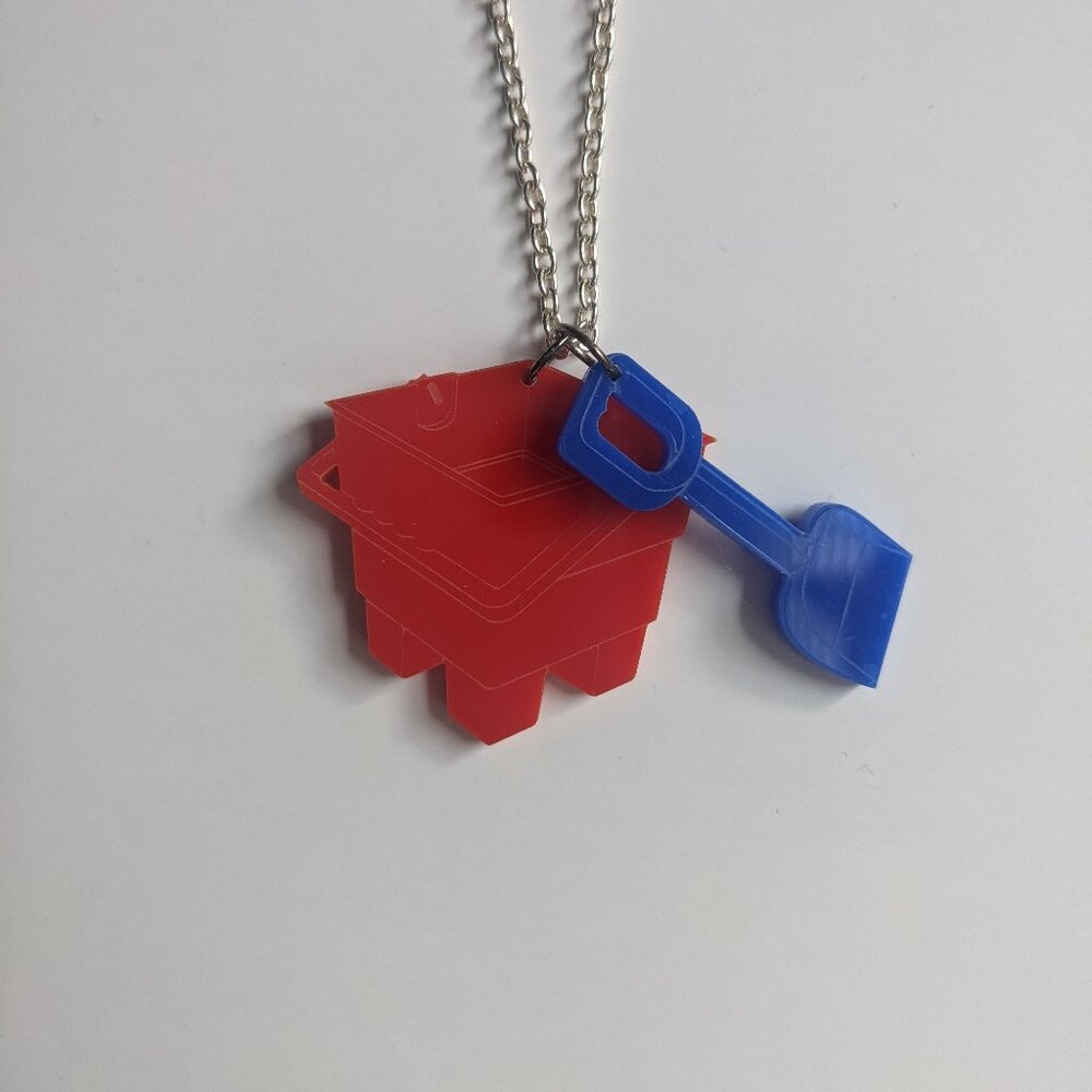 Sugar & Vice Designs acrylic bucket and spade necklace summer beach pool